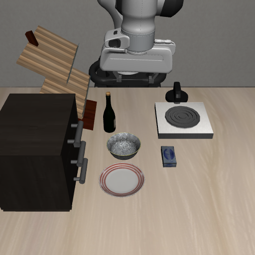 Push the plate to the front of the stove,  frame 0011